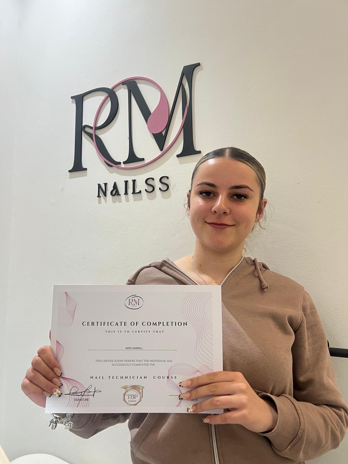 RMNailss Academy student with certificate